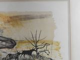 framed picture of a painting of a deer and a tree in a field
