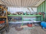 a garage with a lot of tools on the shelves