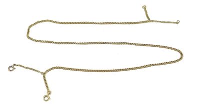 a close up of a gold chain on a white background