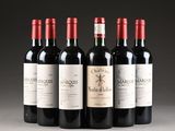 six bottles of red wine are lined up in a row