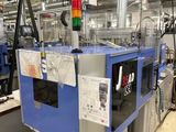 une image représentant une usine avec tout un tas de machines