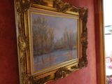 a picture of a painting hanging on the wall