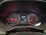 a close up of a car dashboard with a speedometer and gauges