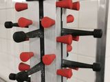 a picture of a rack of knives in a bathroom
