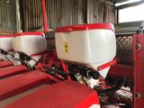 a red and white machine that is sitting in a building