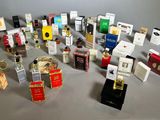 many different types of perfumes on the table