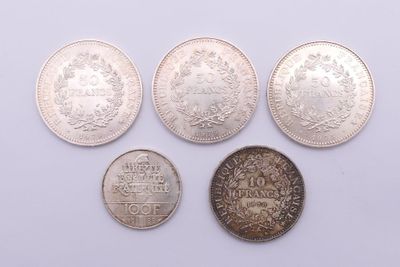 a group of five different british coins