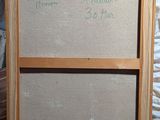 a picture of a picture frame with writing on it