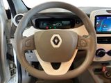 the steering wheel and dashboard of a small car with a touch screen