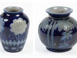 four different views of a blue vase with a flower design on it