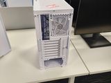 a desktop computer sitting on a desk in front of a computer monitor