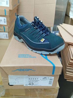 a box with a pair of shoes on top of it