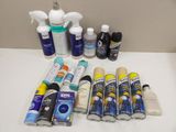many different types of cleaning products laid out on the counter