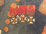 a picture of a painting of a military uniform on the wall