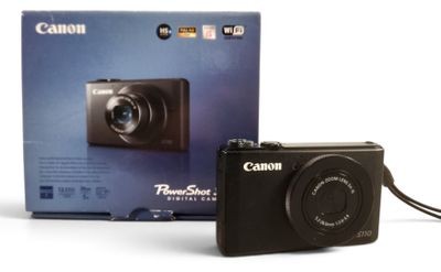 Appareil photo numérique Canon Powersport, avec son emballage d'origine et son chargeur