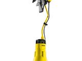 un aspirateur jaune et noir sur fond blanc