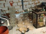 a lot of clutter on the counter in the kitchen