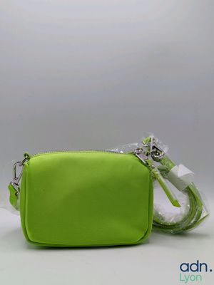 lime green cross body bag with silver zipper