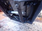 a close up of a motorcycle frame with a motorbike attached to it