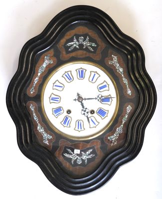 a clock that is hanging on the wall in the room