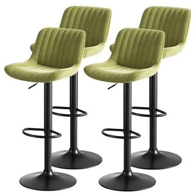 three green velvet bar stools with black metal legs