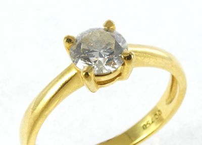 an image of a diamond ring on a white surface