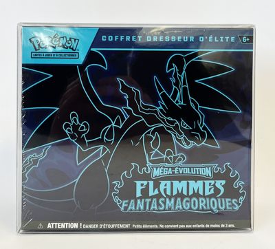 un gros plan d'une carte à collectionner Pokémon posée sur une surface blanche