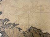 a drawing of a woman sitting on a rock