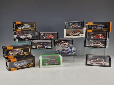 many different models of cars in a display case