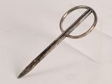 a pair of scissors sitting on top of a white surface
