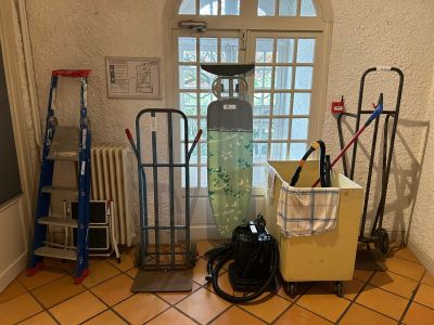 a room with a lot of cleaning equipment in it