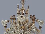 an image of a chandelier made of glass and metal