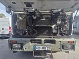 a truck that has a large engine in the back of it