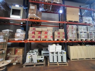 a lot of boxes on the shelves in the warehouse