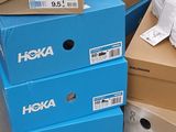 many boxes stacked on top of each other on the floor