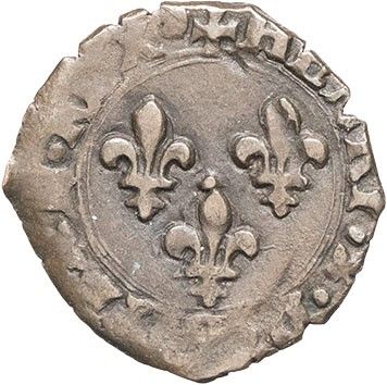 a silver coin with fleurons on the reverse side