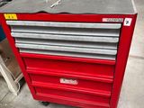 an image of a red tool cabinet in a garage