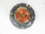 a glass bowl with a red liquid inside of it