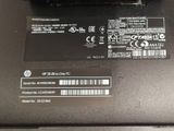 a close up of a laptop with a sticker on it
