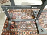 an image of a gym bench on a rug