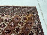 a rug with a pattern on it on the floor