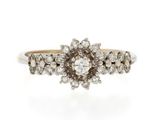 a close up of a diamond ring on a white background