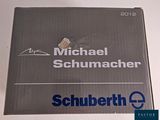 a box that has a picture of michael schmuchacher on it