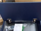 a blue box with some papers inside of it