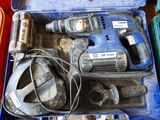 a blue tool box with tools in it on a table