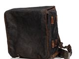 messenger bag made of waxed canvas and leather with brown leather trim