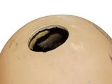 an image of a vase with a hole in it