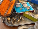 a table with silverware and silverware on it