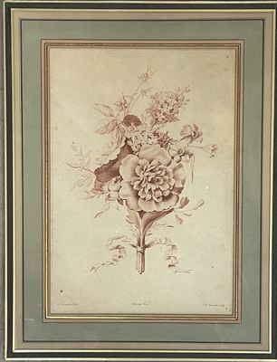 tableau représentant un bouquet de fleurs dans un cadre accroché au mur