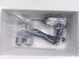 a box with a hair dryer and a cord in it